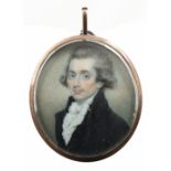 λEnglish School late 18th Century Portrait miniature of a gentleman, wearing a black coat, and