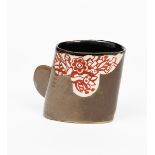 ‡John Maltby (1936-2020) a stoneware mug, angled elliptical body with applied solid handle,