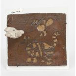 ‡John Maltby (1936-2020) a stoneware tile, resist decorated with a cat and bird design in tenmoku,