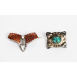 A Murrle Bennett silver and turquoise brooch, rectangular section, cast in low relief with foliate