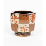 ‡John Maltby (1936-2020) a stoneware footed beaker vase, octagonal section, painted in resist with a
