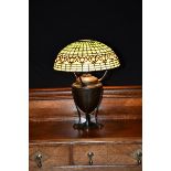 'Pomegranate' a Tiffany Studios patinated metal table lamp with leaded glass shade, the domed