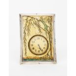 A Henry Clifford Davis easel backed silver travel clock, the rectangular frame with painted panel of