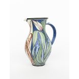 ‡Laurence McGowan (born 1942) a tin-glazed jug, bellied form, painted with alternate grass and tulip