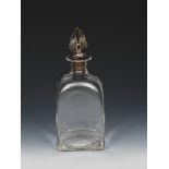 A James Powell & Sons Flint glass decanter with silver stopper designed by Harry Powell, shouldered,