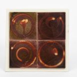 ‡Alan Caiger Smith MBE (1930-2020) an Aldermaston Pottery four tile panel, painted with circular