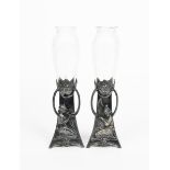 A pair of Art Nouveau WMF pewter and glass vases, waisted triangular form, one cast with a maiden