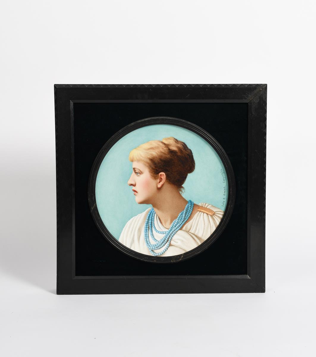 An Aesthetic Movement portrait wall plaque by Julia C Smith, painted with a portrait of a woman with