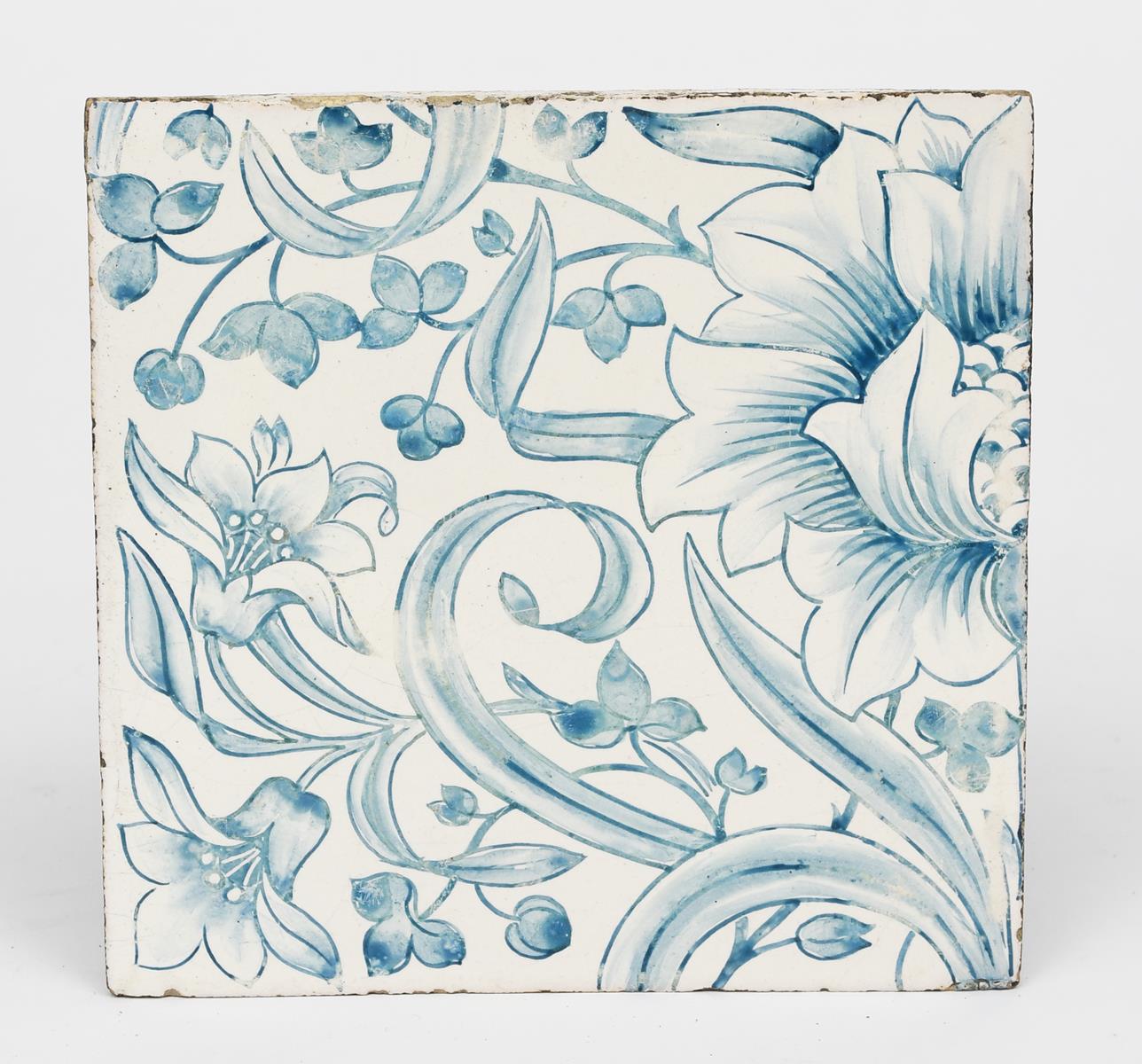 A Morris & Co Lily tile the design attributed to William Morris, painted with flower design in