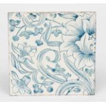 A Morris & Co Lily tile the design attributed to William Morris, painted with flower design in