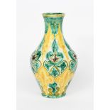 A Della Robbia Pottery vase by Hannah Jones, shouldered ovoid form with flaring cylindrical neck,