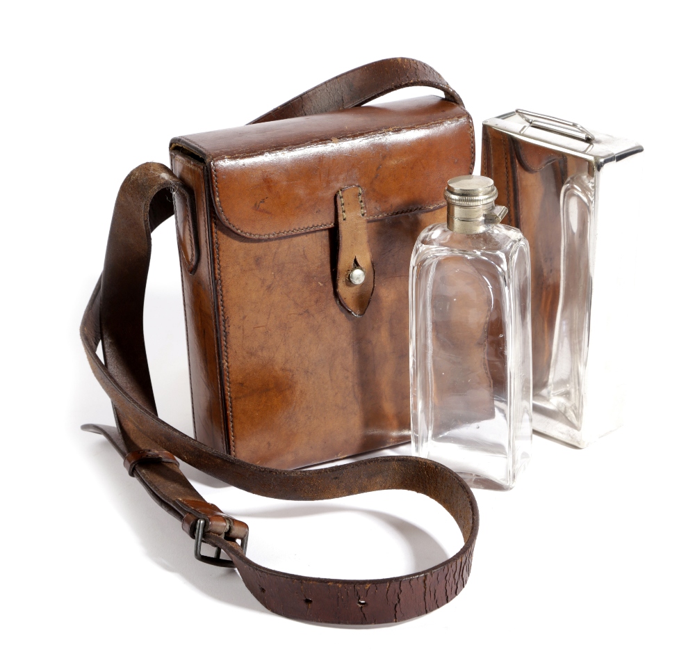 A BROWN LEATHER SANDWICH TIN AND FLASK CASE PROBABLY CAMPAIGN, EARLY 20TH CENTURY with a silver