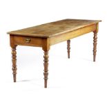 A FRENCH PROVINCIAL CHERRYWOOD FARMHOUSE KITCHEN TABLE 19TH CENTURY the boarded top with cleated