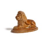 A BROWN STONEWARE POTTERY MODEL OF A RECUMBENT LION C.1840 on an oval stepped base with a ribbed