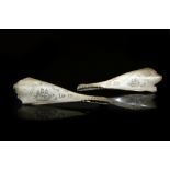 A SAILOR'S SCRIMSHAW BOTTLENOSE DOLPHIN JAW BONE MID-19TH CENTURY the exterior of each half engraved