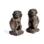 A PAIR OF BRONZE HERALDIC LIONS PROBABLY ITALIAN, 19TH CENTURY each holding a vacant cartouche,