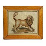 A VICTORIAN WOOLWORK PICTURE OF A ROARING LION C.1860 in a glazed bird's eye maple frame 21.5 x 28cm