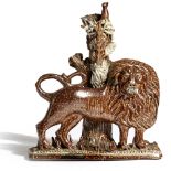 A RARE FOLK ART BROWN STONEWARE SALTGLAZED POTTERY FLATBACK LION PROBABLY DERBYSHIRE, C.1800-30