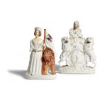 A STAFFORDSHIRE POTTERY GROUP OF QUEEN VICTORIA AND THE BRITISH LION MID-19TH CENTURY together