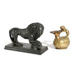 AN EBONISED PLASTER MODEL OF THE MEDICI LION 20TH CENTURY together with an Italian gilt plaster
