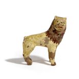 A FOLK ART PAINTED TERRACOTTA MODEL OF A LION EARLY 19TH CENTURY 15.7cm high, 13.8cm wide Provenance