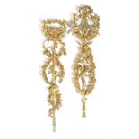 TWO GILTWOOD WALL APPLIQUES IN LOUIS XVI STYLE 20TH CENTURY each with a ribbon tied surmount, one