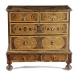 A WILLIAM AND MARY OYSTER VENEERED AND MARQUETRY CHEST ON STAND C.1690-1700 with holly banding and