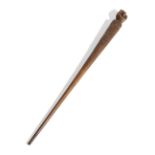 A HARDWOOD SAILOR'S FID 19TH CENTURY with a clenched fist terminal, the tapering shaft with chip