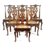 A SET OF SIX GEORGE III OAK SIDE CHAIRS 18TH CENTURY AND LATER each later carved with birds, leaves,