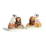 A MATCHED PAIR OF STAFFORDSHIRE POTTERY LION GROUPS MID-19TH CENTURY each modelled with a