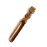 A TREEN APPLE CORER LATE 18TH / EARLY 19TH CENTURY with chip carved decoration 11cm long