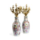 A LARGE PAIR OF CHINESE PORCELAIN FAMILLE ROSE VASE CANDELABRA QING DYNASTY, LATE 19TH / EARLY