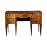 A GEORGE III MAHOGANY SERPENTINE SIDEBOARD SHERATON PERIOD, IN THE MANNER OF GILLOWS, C.1790