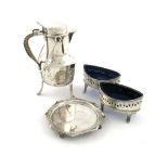 A mixed lot of silver items, comprising: a hot milk pot, by Mappin and Webb, London 1904, baluster