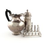 A mixed lot of silver items, comprising: an Edwardian hot water pot, by The Barnards, London 1903,
