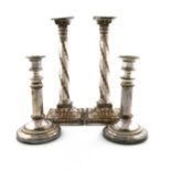 A pair of George III old Sheffield plated candlesticks, unmarked, circa 1780, Corinthian column