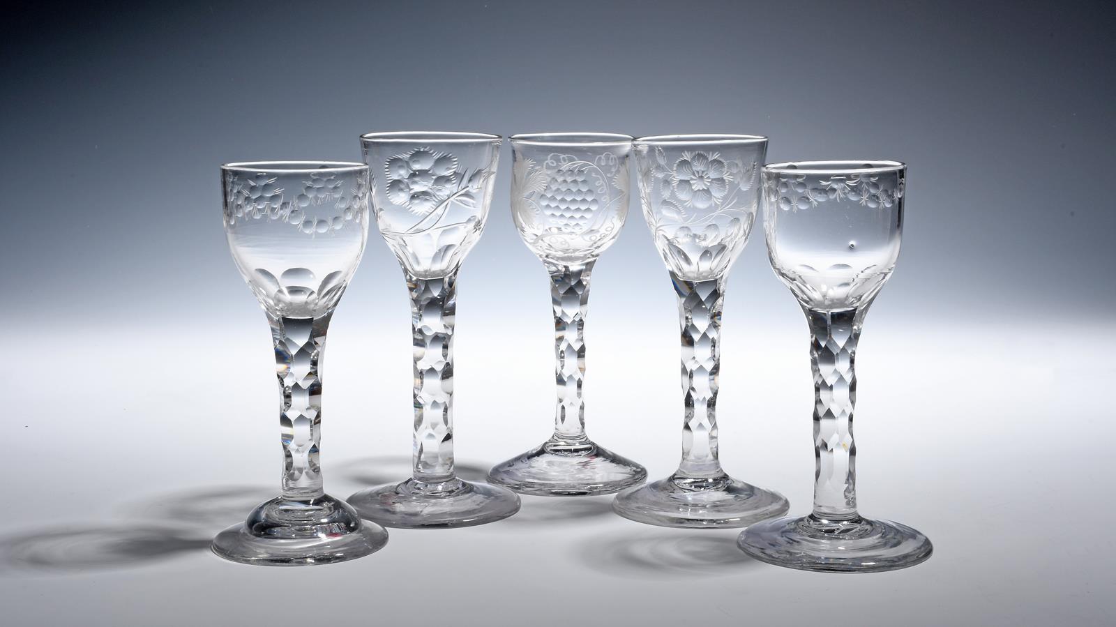 Five small wine glasses c.1760-70, a near pair with ogee bowls engraved with polished swags, two