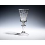 A Saxon Dutch-engraved glass goblet c.1740, the bowl engraved with the arms of George II of England,