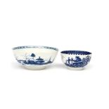 Two Worcester blue and white bowls c.1765-75, the smaller printed with the Fisherman and Cormorant