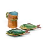 Two Minton Majolica fish dishes c.1869-71, each modelled as an open-mouthed fish, detailed in green,