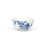 A Worcester blue and white slop bowl c.1755-58, painted with the Prunus Fence pattern, of