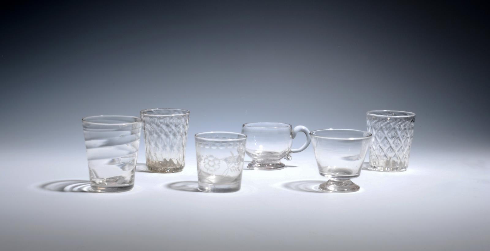 Three small glass tumblers c.1760-80, one of Lynn type with horizontal moulding, two others with