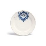 A delftware plate dated 1705, painted in blue with the letter T over G D within a scroll cartouche