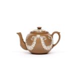 A James Dudson (Staffordshire) drabware teapot and cover late 19th century, finely applied with