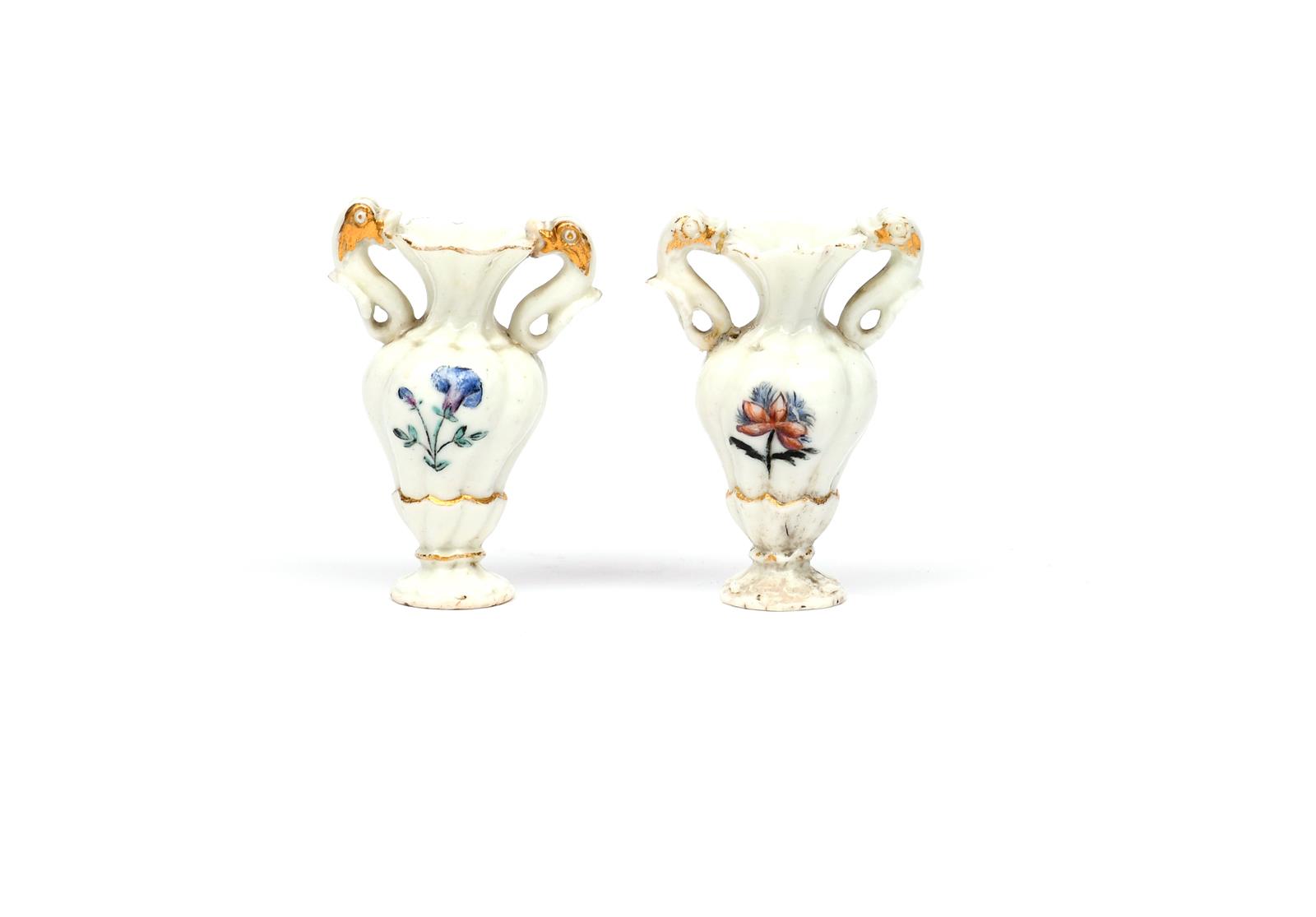 A pair of miniature Italian porcelain vases c.1750-70, probably Capodimonte or Buen Retiro, after