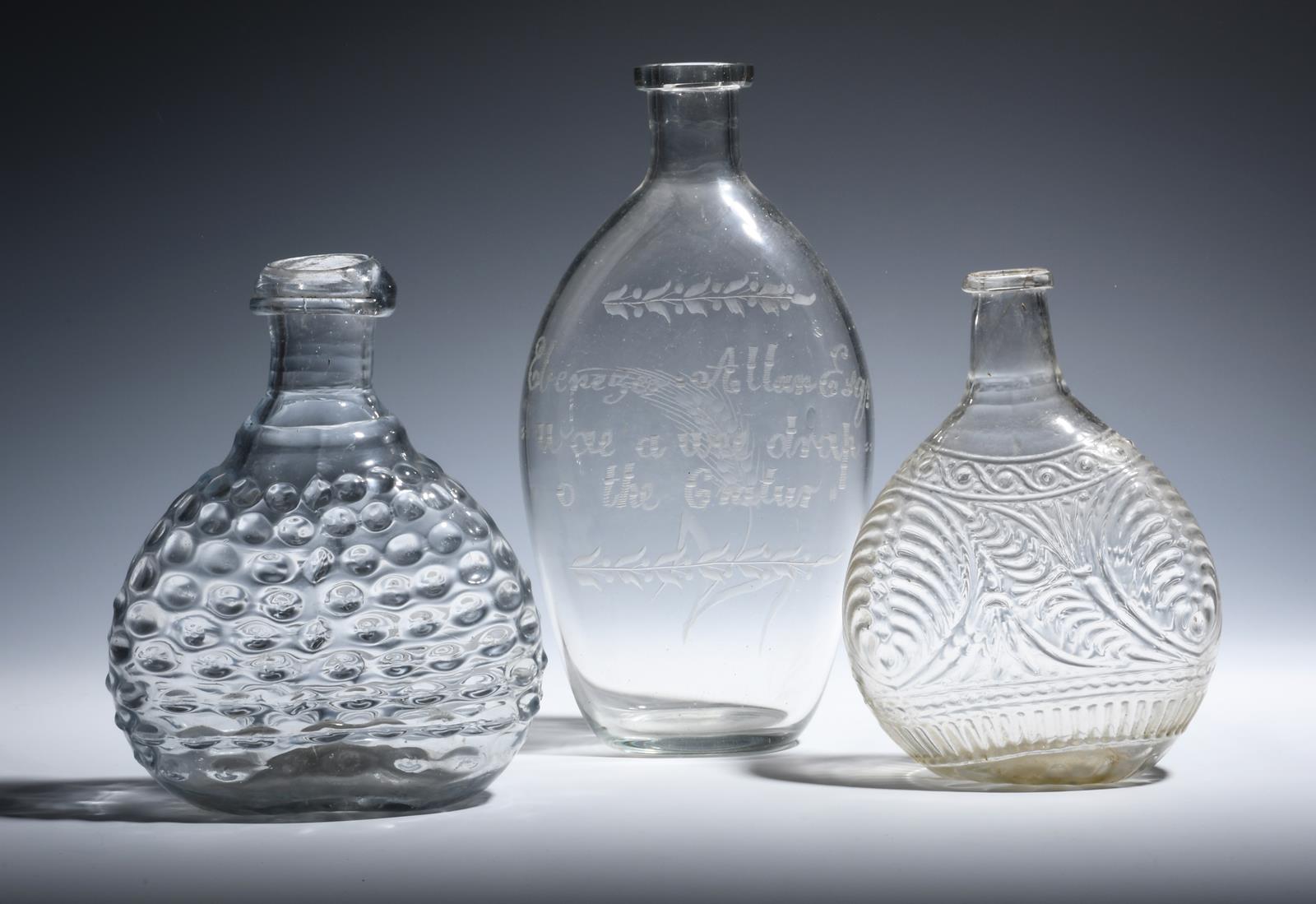 Three glass flasks late 18th/19th century, of flattened form, one Scottish and engraved to 'Ebenezer