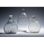 Three glass flasks late 18th/19th century, of flattened form, one Scottish and engraved to 'Ebenezer