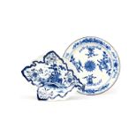 A Derby blue and white leaf dish c.1765-70, painted with a Chinese landscape scene with a hut