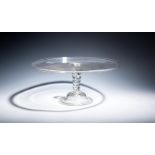 A large glass tazza c.1740, the wide circular top with a galleried rim, raised on a bobbin stem with