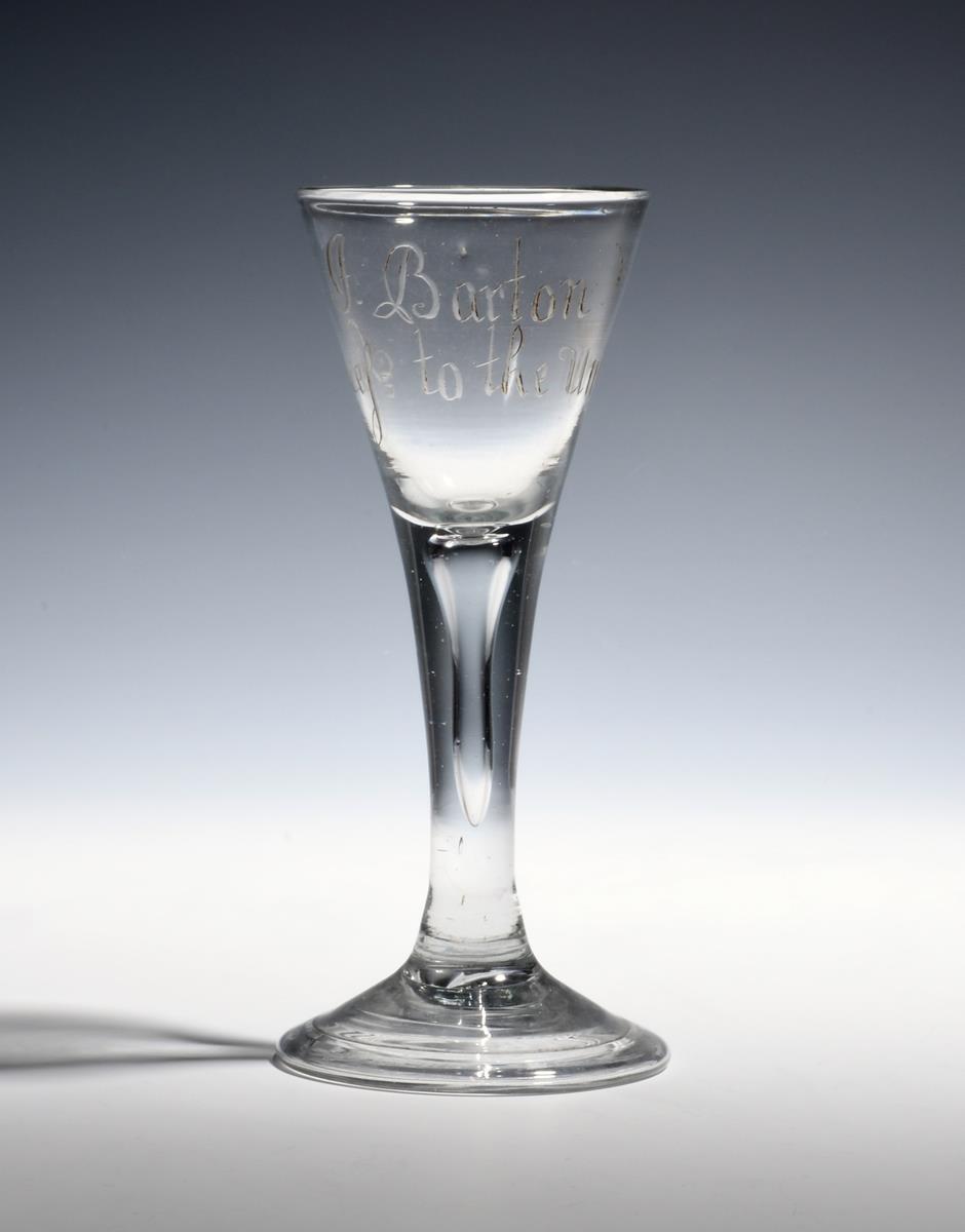 A privateer wine glass c.1780, the drawn trumpet bowl engraved 'J Barton / Success to the Unity',